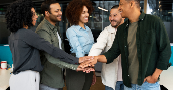 group of people shaking hands